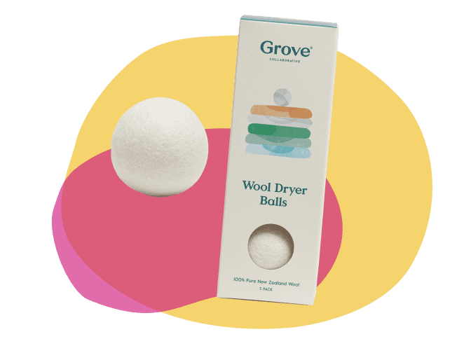 A box of wool dryer balls over illustrated shapes