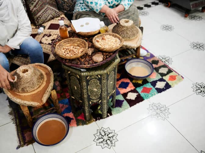 Photo of women making argan oil