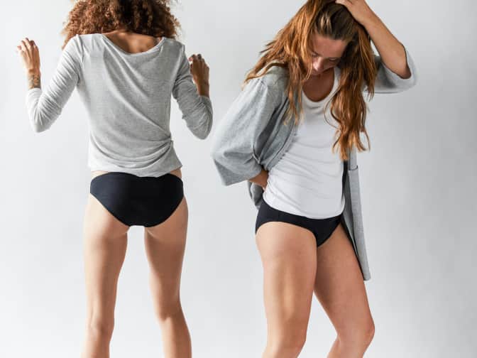 two women in period underwear