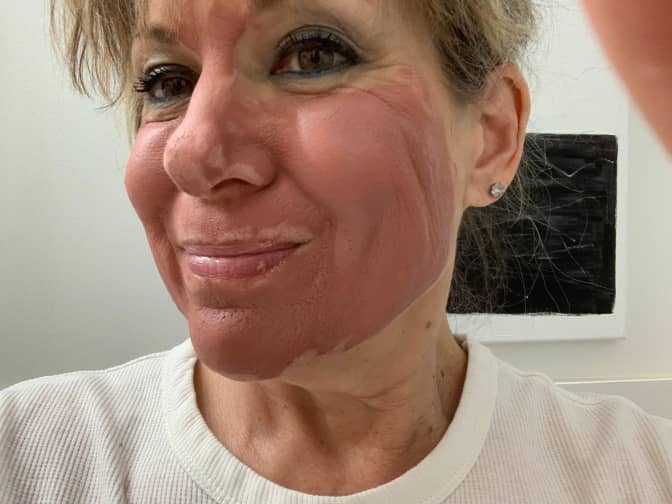 Photo of woman wearing clay mask