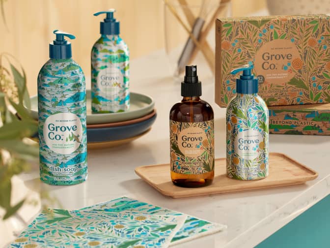 Image of Grove Co.'s summer collection. Collection includes two Alaskan inspired scents and includes dish soap, hand soap, room spray, and laundry detergent sheets in sustainable packaging.