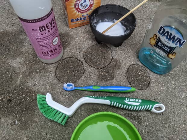 Image of cleaning supplies on concrete