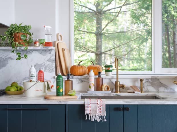 Marble countertops and sink with fall Grove cleaning supplies