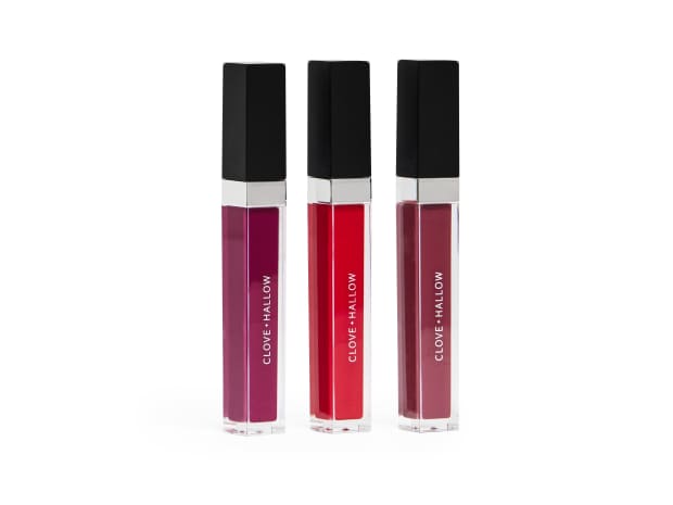 Photo of three Clove + Hallow lip velvet lipsticks against white background